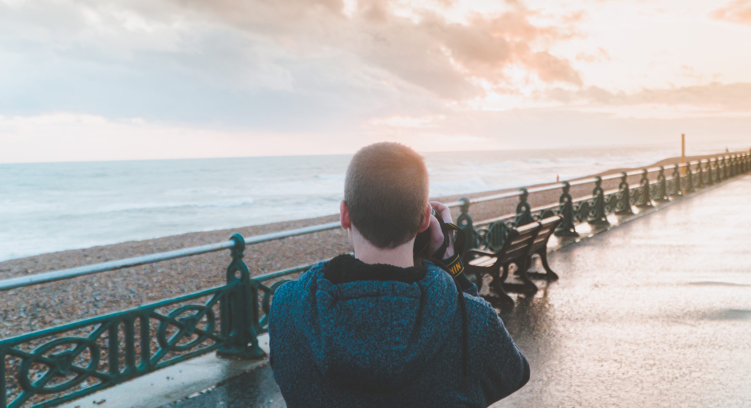 Man Looking at a Pink Sunset